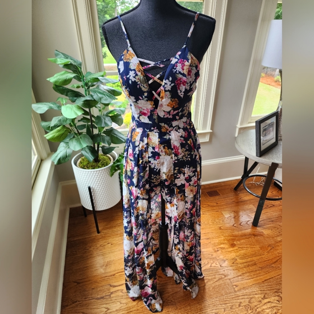 Size M Romper with chiffon skirt overlay. No tags, never worn. Miss Avenue